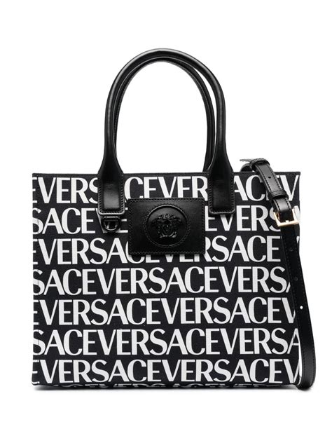 versace black label tote.